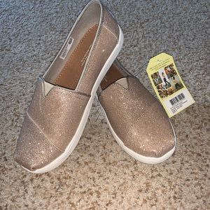 Girls youth size 5 Toms in a rose gold sparkle